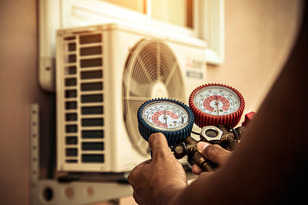 Professional Air Conditioning Service technician working in Paris, VA